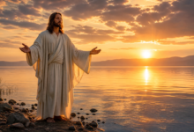 Jesus Christ standing at sunrise on calm lake shore